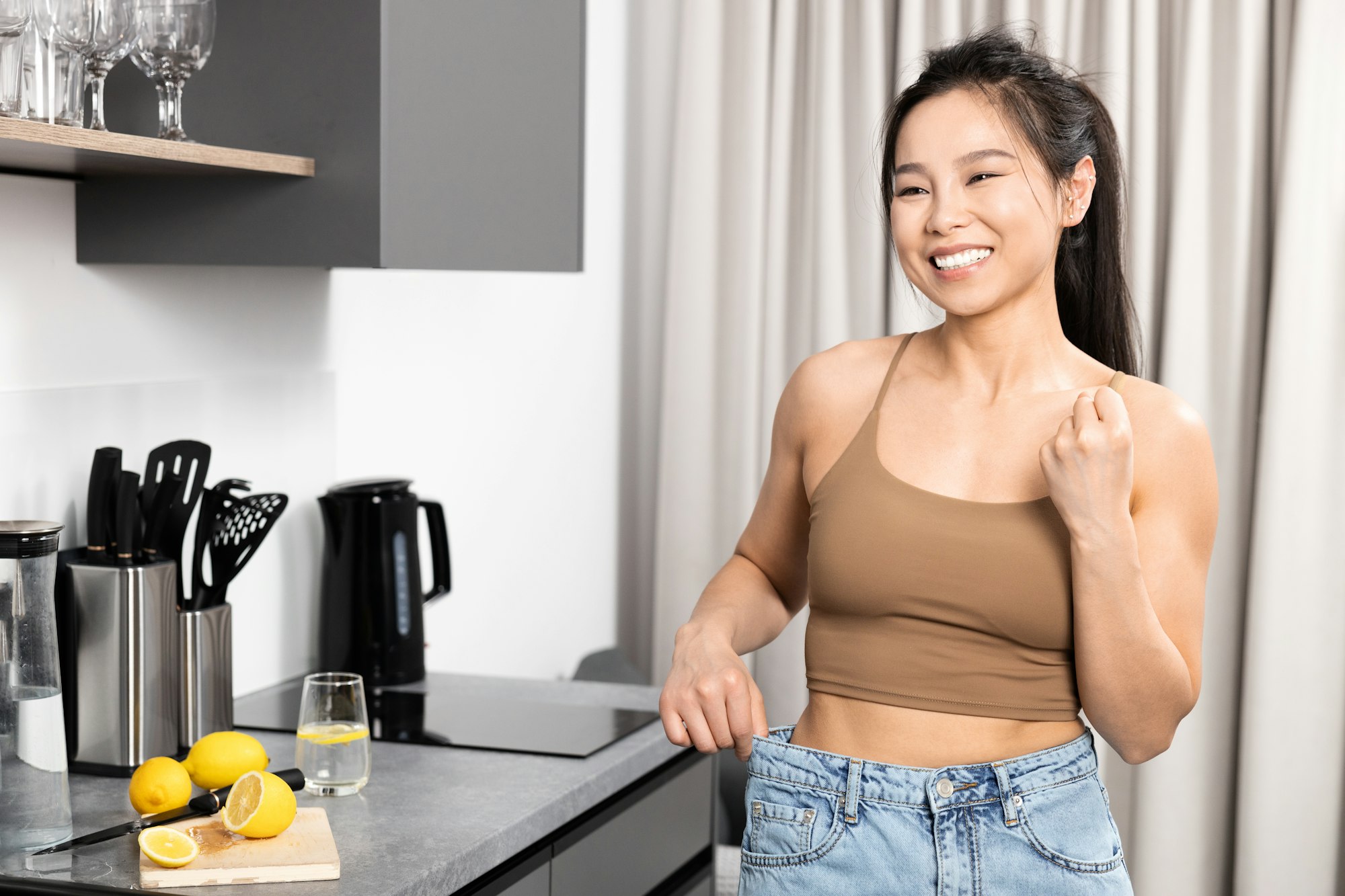 Happy Young Woman Celebrating Weight Loss