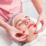 young-woman-getting-spa-treatment-at-beauty-salon-P2ZQFSR